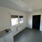 Contentor com escritório, cozinha, casa de banho e duche, com 6,00 x 2,43 m.